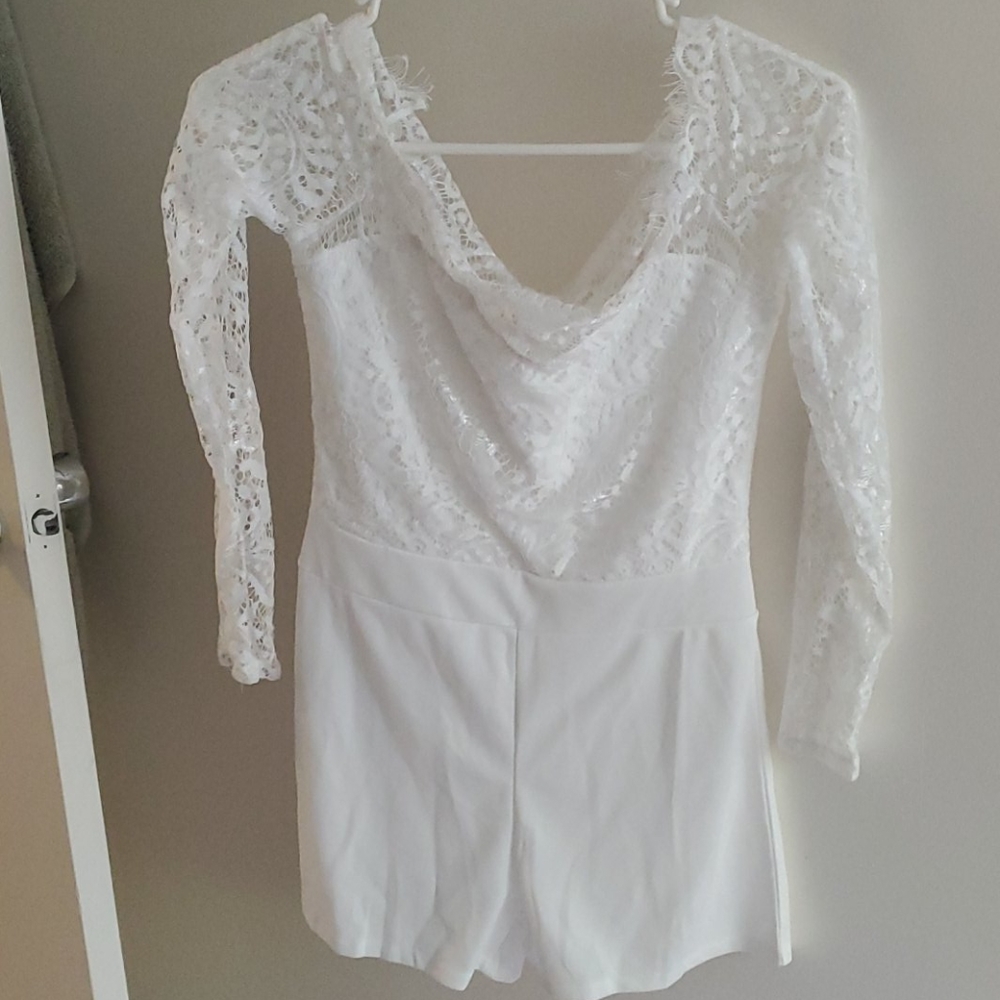 White ruffled top off the shoulder romper